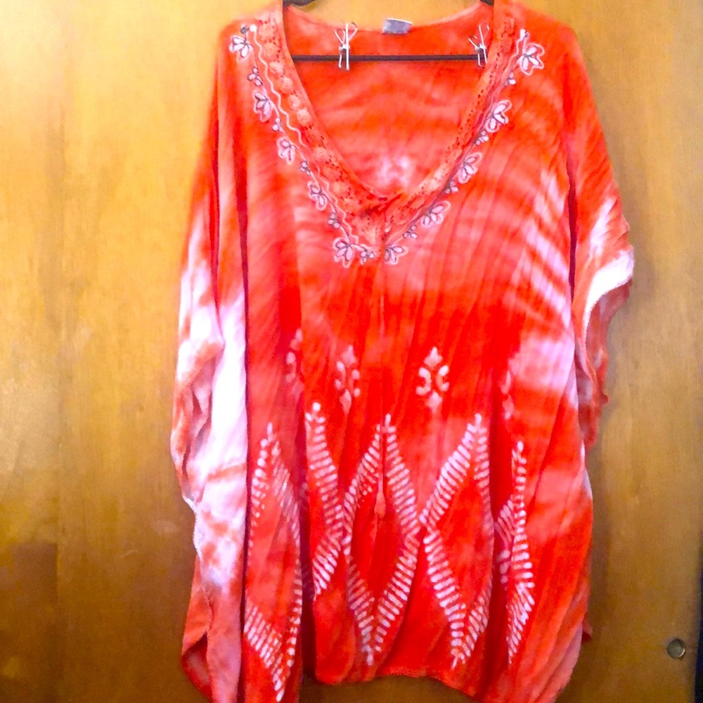 Orange blouse or a swimsuit cover